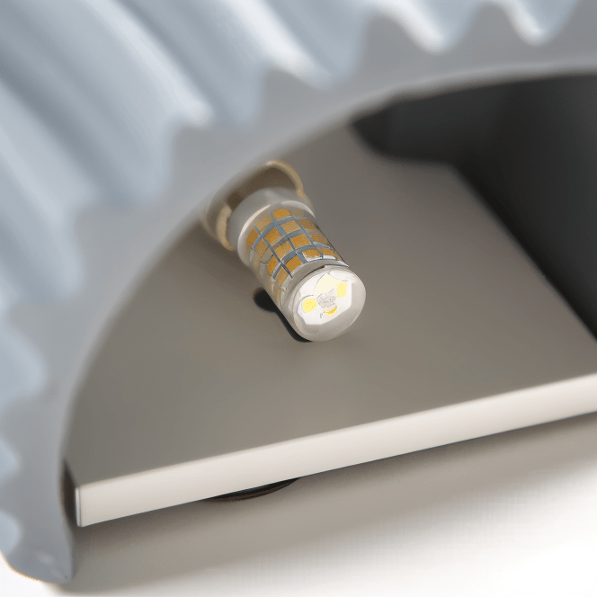 Kiana Resin Wall Lamp with Pleated Texture and Curved Design