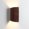 Kiana Resin Wall Lamp with Pleated Texture and Curved Design