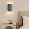 Kiana Resin Wall Lamp with Pleated Texture and Curved Design