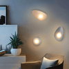 JANA Pebble Glass Wall Sconce With Warm Diffused Light For Modern Ambiance