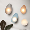 JANA Pebble Glass Wall Sconce With Warm Diffused Light For Modern Ambiance
