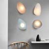 JANA Pebble Glass Wall Sconce With Warm Diffused Light For Modern Ambiance