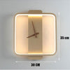 Cassalyn Contemporary Lighted Wall Clock