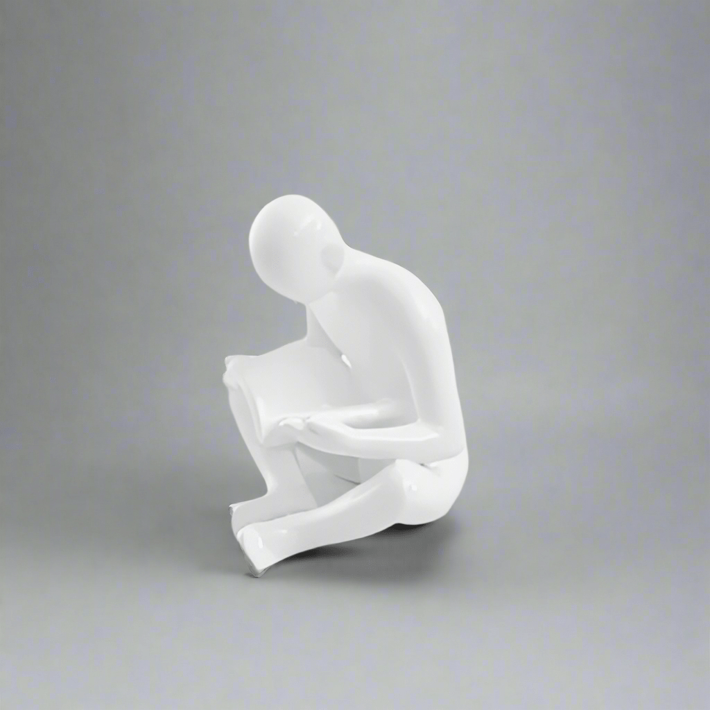 Liam - Creative Bookend with Reading Man Sculpture